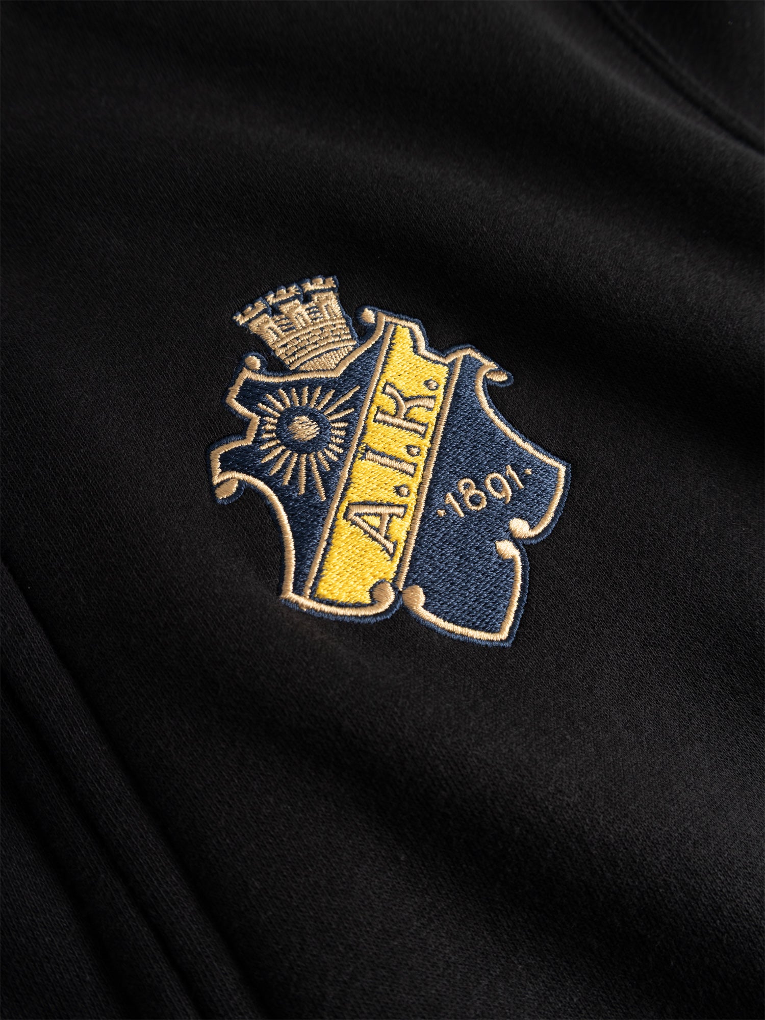 Zip Hood sköld